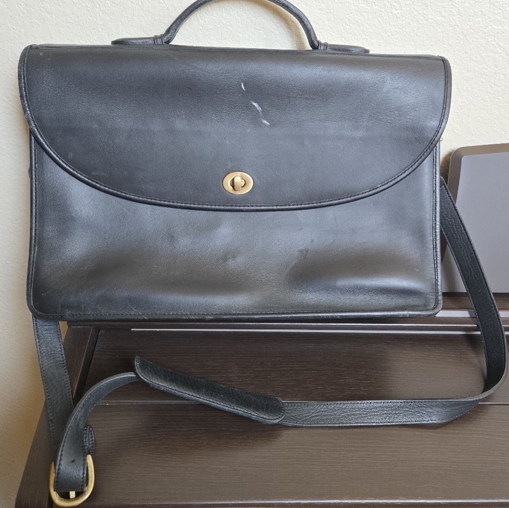 Unbraded black leather messenger bag academia